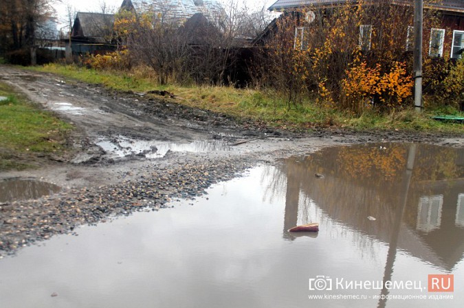 Огромные ямы избороздили в Кинешме улицу 12 Декабря фото 9