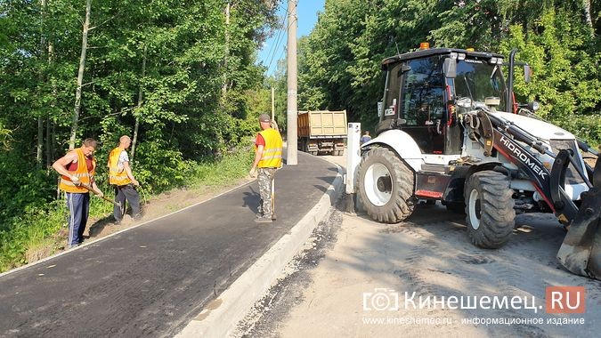 На мосту через Казоху полным ходом идет асфальтирование дорожного полотна фото 2
